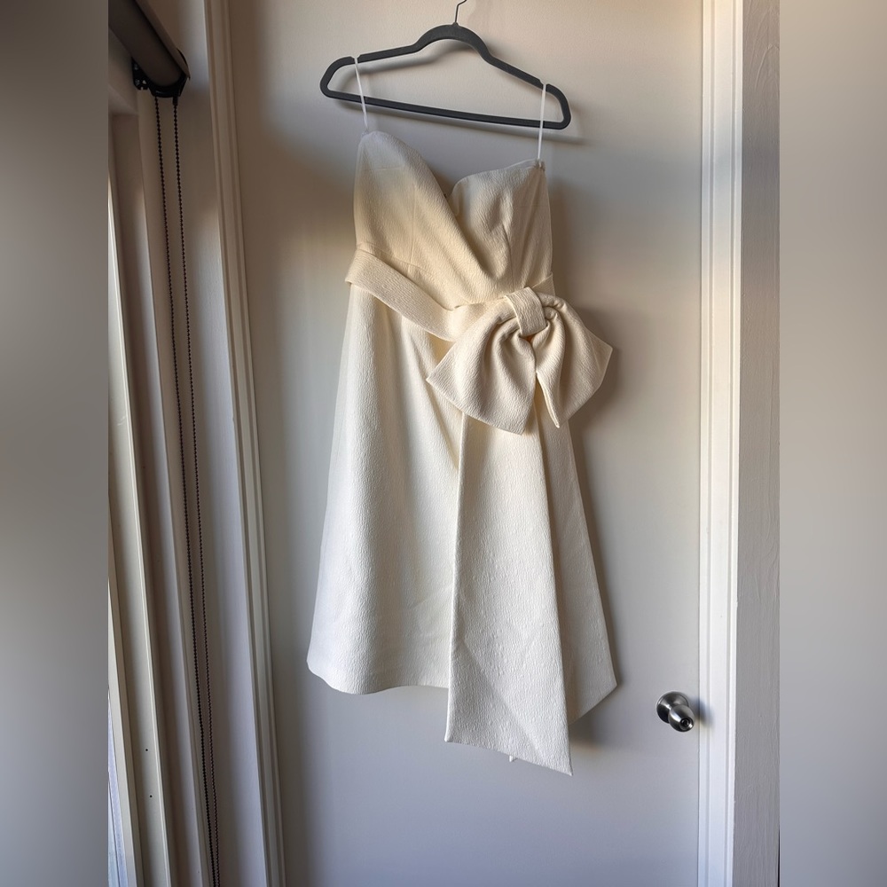 Greta strapless bow-embellished cloqué midi dress